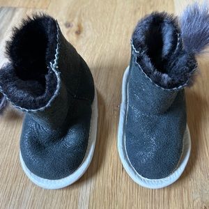 Black/grey suede + fur baby slippers w/ leather piping. Size 4.5. From Poland.